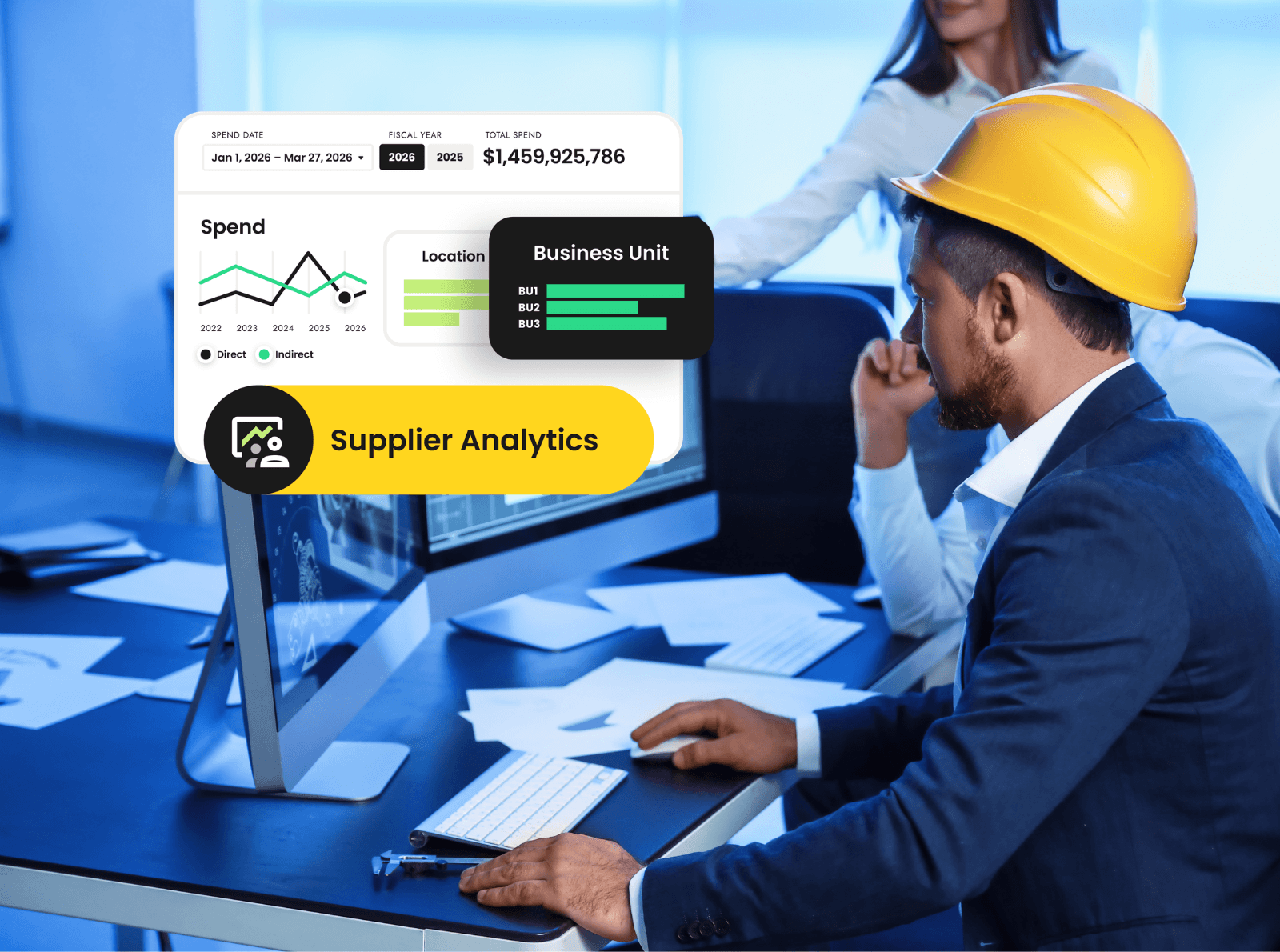 Man looking at his laptop with construction hat.